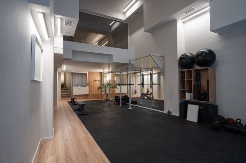 SESSION Fitness — main training floor and mezzanine Pilates studio